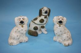 Three Staffordshire dogs