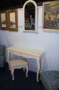 A modern cream bedroom side table, mirror and stool