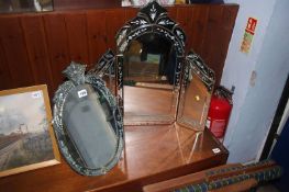 Two Venetian style mirrors