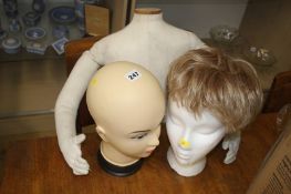 Mannequin and two heads