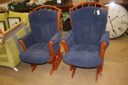 A pair of Dutailier rocking chairs