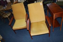 A pair of Guy Rogers 'Manhattan' recliner armchairs