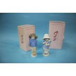 Two Nao figures, boxed