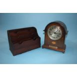 An Edwardian mantel clock and a letter rack