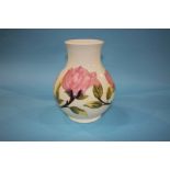 A modern Moorcroft vase, decorated with pink anemones