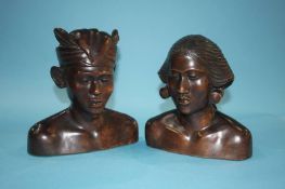 Pair of carved tribal busts