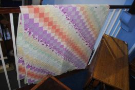 An American multi-coloured patchwork quilt