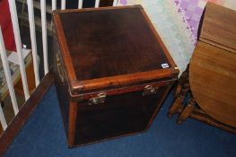 A modern brown leather studded trunk