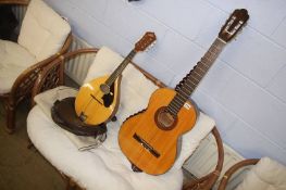 An Ibanez guitar and a Levin of Sweeden mandolin model 158 (with soft case)