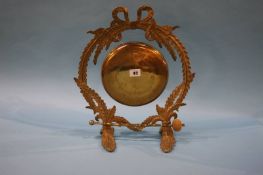 A brass dinner gong