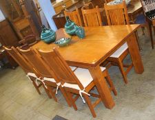 A large refectory style table and six chairs