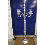 A tall four branch candelabra