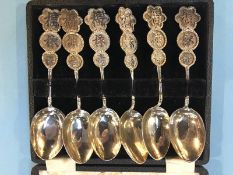 A set of six Oriental tea spoons with fitted case