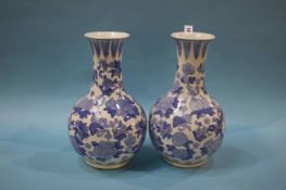 A pair of modern blue and white Oriental vases