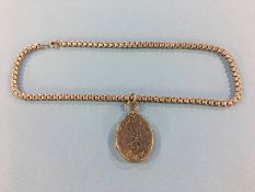 A sterling silver locket and chain