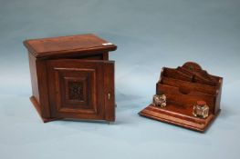 A small oak chest and an oak ink stand