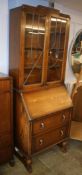 An oak bureau bookcase