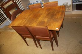 An Alfred Cox teak dining table and four chairs