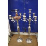 A pair of four branch candelabra