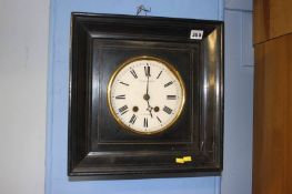 Ebonised wall clock with 8 day movement, enamelled dial, by W. H. Tooke a Paris