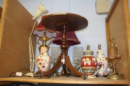 Various lamps and an occasional table