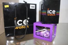 An Ice watch with box and bag