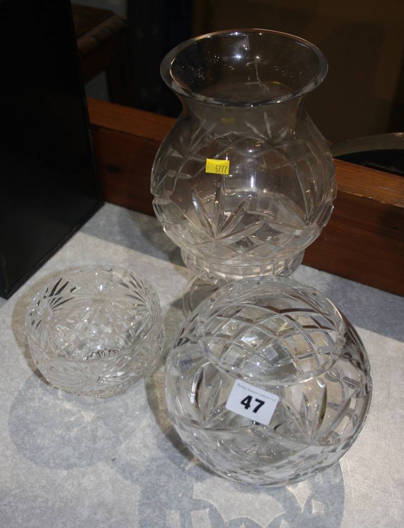 Glass hurricane lamp and two vases