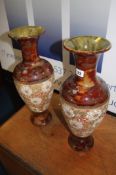 A pair of Doulton Slater Patent vases, 47cm height