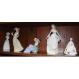 Four Nao figures and a Doulton figure