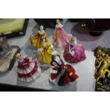 Five Royal Doulton figurines and a Coalport figure