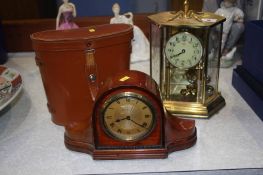 Two clocks and a pair of binoculars