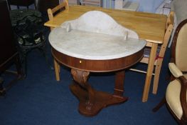 A Victorian mahogany half moon marble top side table