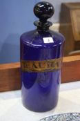 A blue glass Chemist bottle