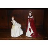 Royal Worcester figure of the Queen and a Doulton figure