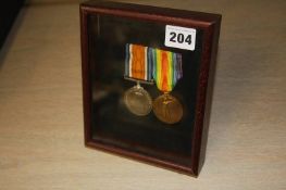 Framed pair of World War I medals