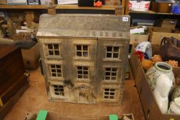 A wooden dolls house