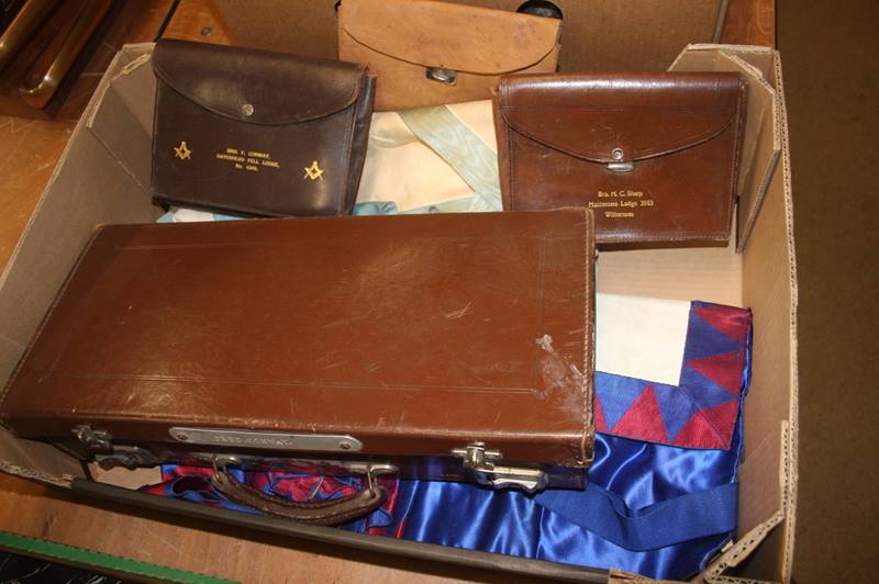 A box of Masonic paraphernalia, aprons etc.