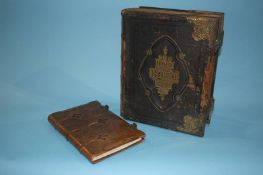 A leather bound book 'Sandro Botticelli' and a Family Bible