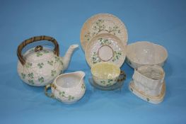 A quantity of modern Belleek pottery, brown and black printed marks