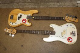 Two autographed Bass guitars