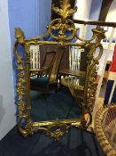 Ornate gilt mirror, 129cm x 72cm