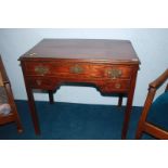 A Georgian mahogany low boy, with one long drawer and two short drawers, 79cm wide