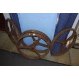 Four cast iron wagon wheels, 60cm diameter