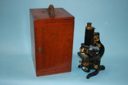 A 'Service' microscope by W. Watson and Sons Limited, with box