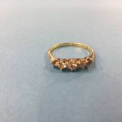 A 18ct ct gold diamond ring, set with five graduated diamonds