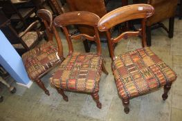 A set of three 19th century mahogany chairs