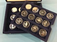 A collection of 24 silver commemorative crowns