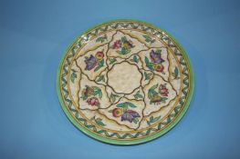 A Charlotte Rhead Crown Ducal wall plaque, 32cm diameter