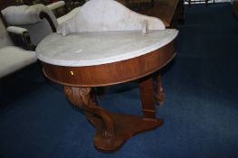 A Victorian half moon marble top washstand