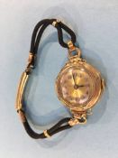 A ladies gold coloured wristwatch
